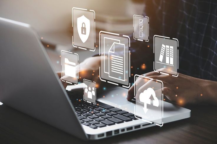 businessman using a computer to document management concept, online documentation database and digital file storage system or software, records keeping, database technology, file access, doc sharing